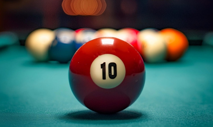 Close-up of the number 10 ball of billiards